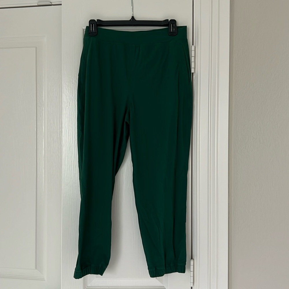 LuluLemon Cropped Joggers. Like new. Only worn once. Pockets. Zippered pant leg.